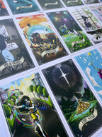 Collection of tarot cards with various designs and text